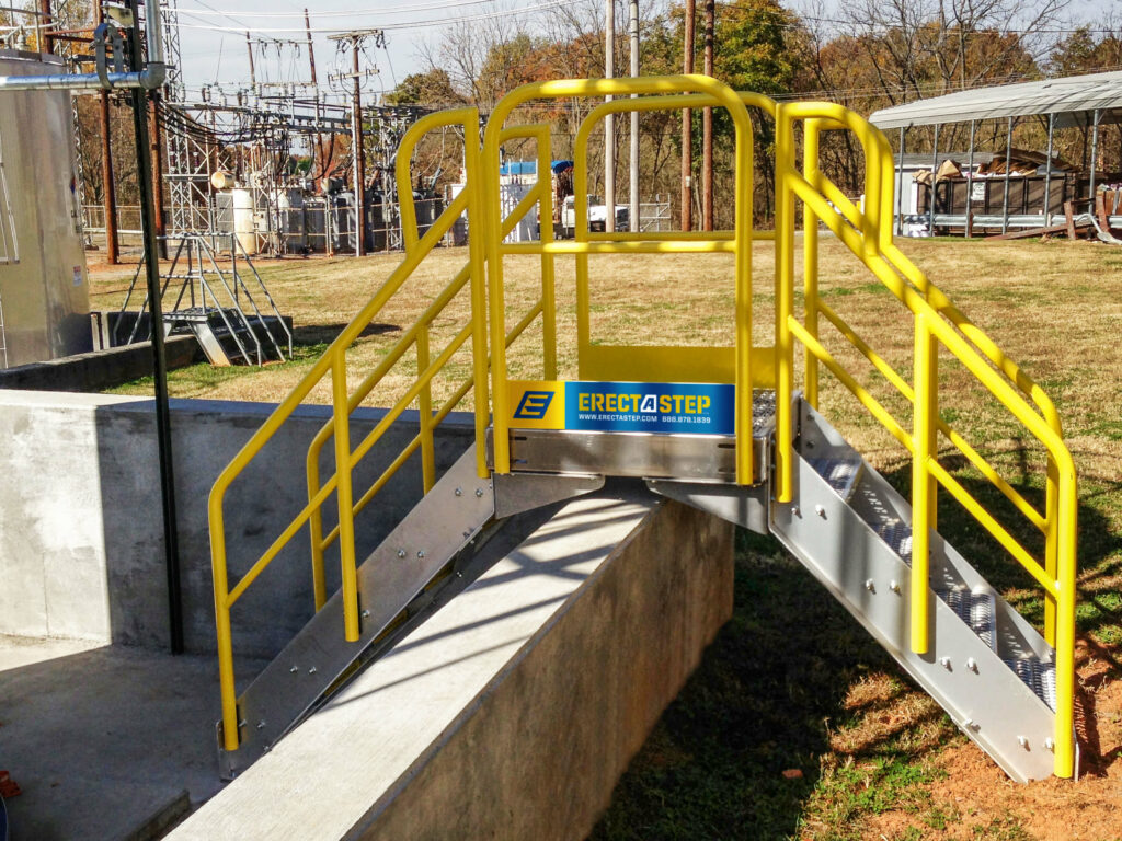 Erectastep 5-step industrial crossover stairs in use shurtape entry into tank farm area