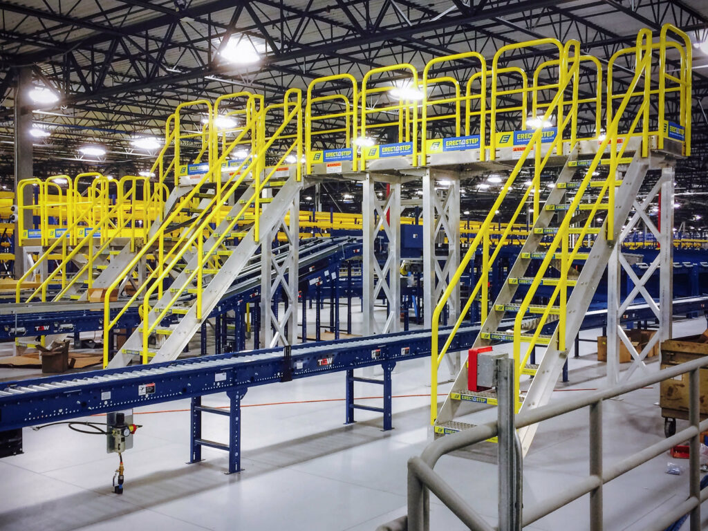 Erectastep MSC Distribution center raised walkway service platform over roller tables