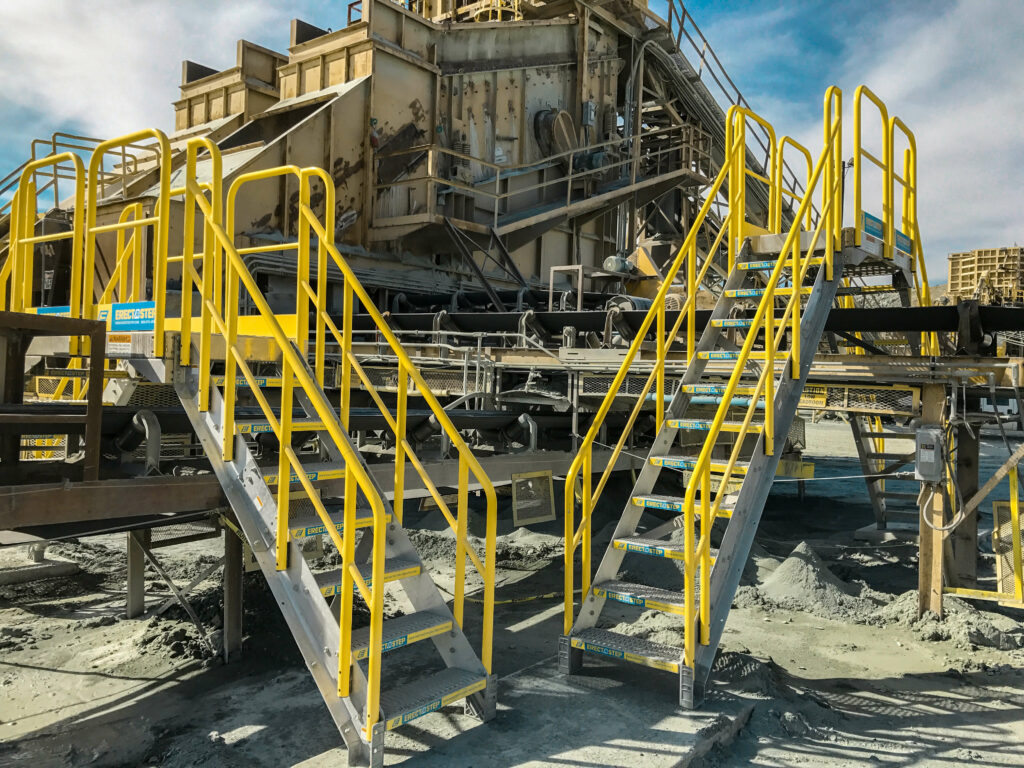 Erectastep dual industrial Crossover stairs over Cement Conveyor Belt