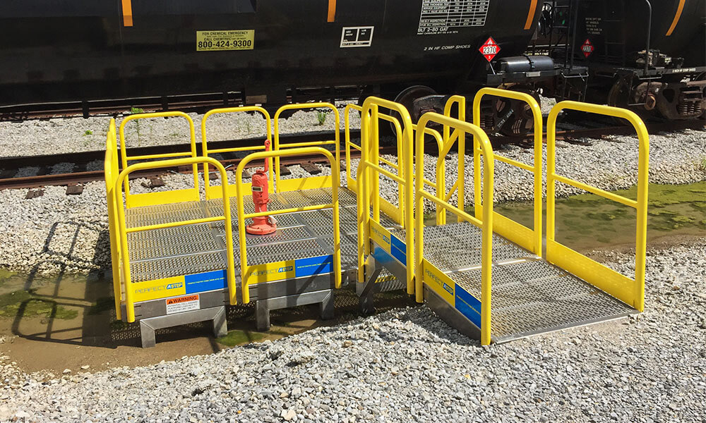 PerfectaStep railcar pipe access over spillway