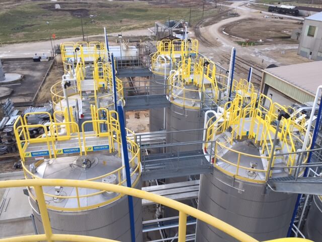 Outdoor Metal Stairs and Work Platforms on Top of Tanks at Tank Farm