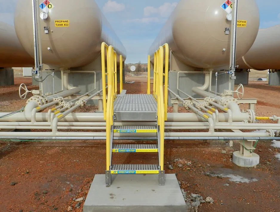 Propane tank field crossover stair installation