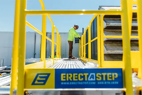 Pharmaceutical rooftop crossover stair being installed