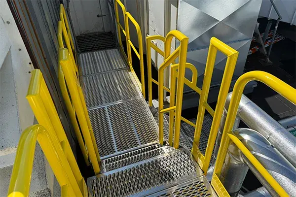Pharmaceutical rooftop crossover stair installation