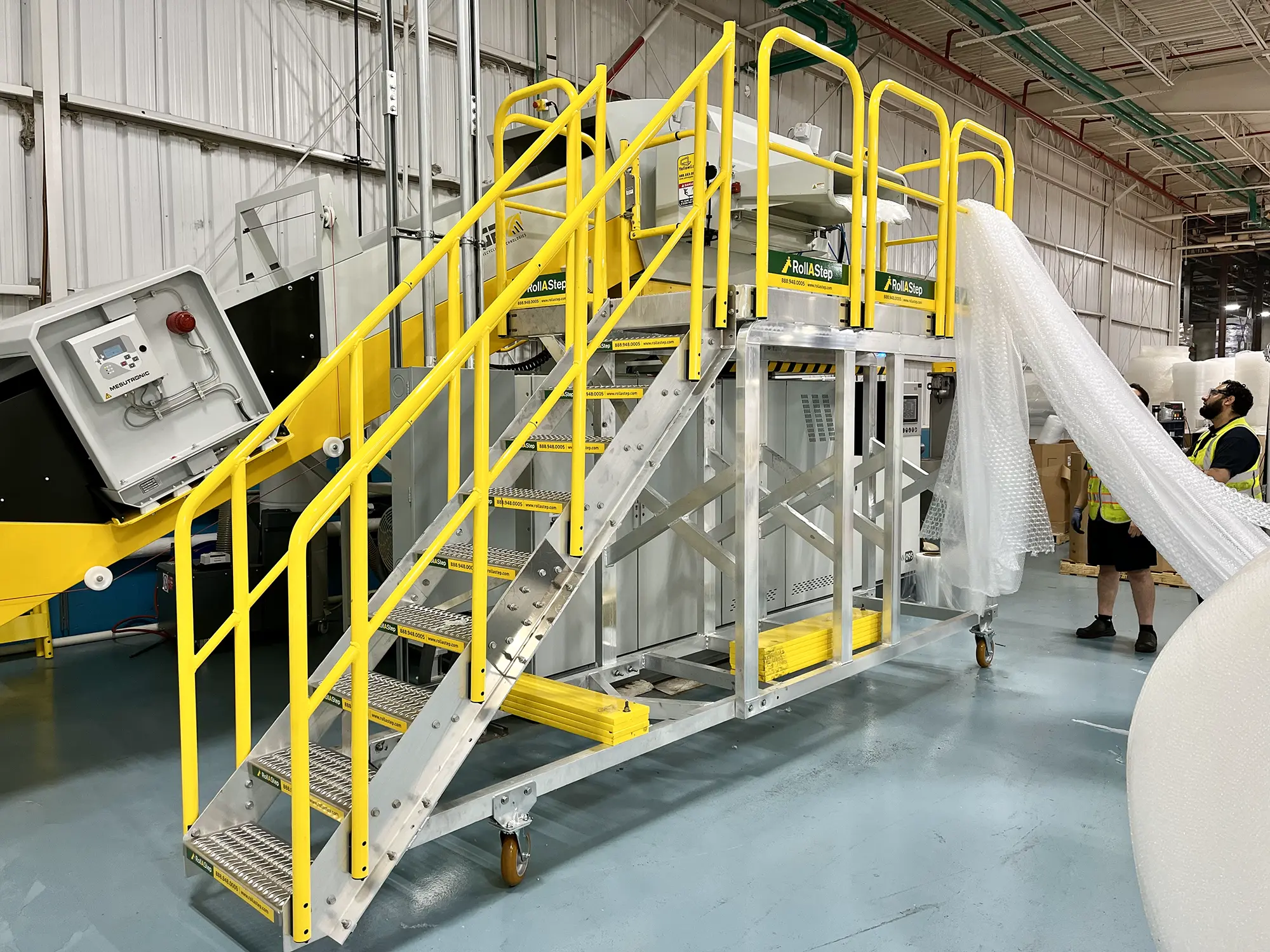 Bubble Wrap Manufacturer Uses RollaStep Mobile Work Platform for Elevated Equipment Access   