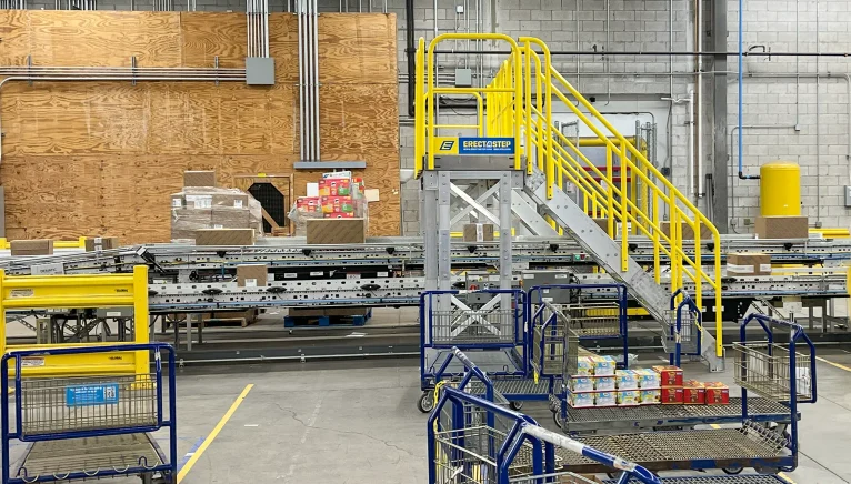 Distribution Center Adds ErectaStep Conveyor Crossover Stairs for Safer Warehouse Access  